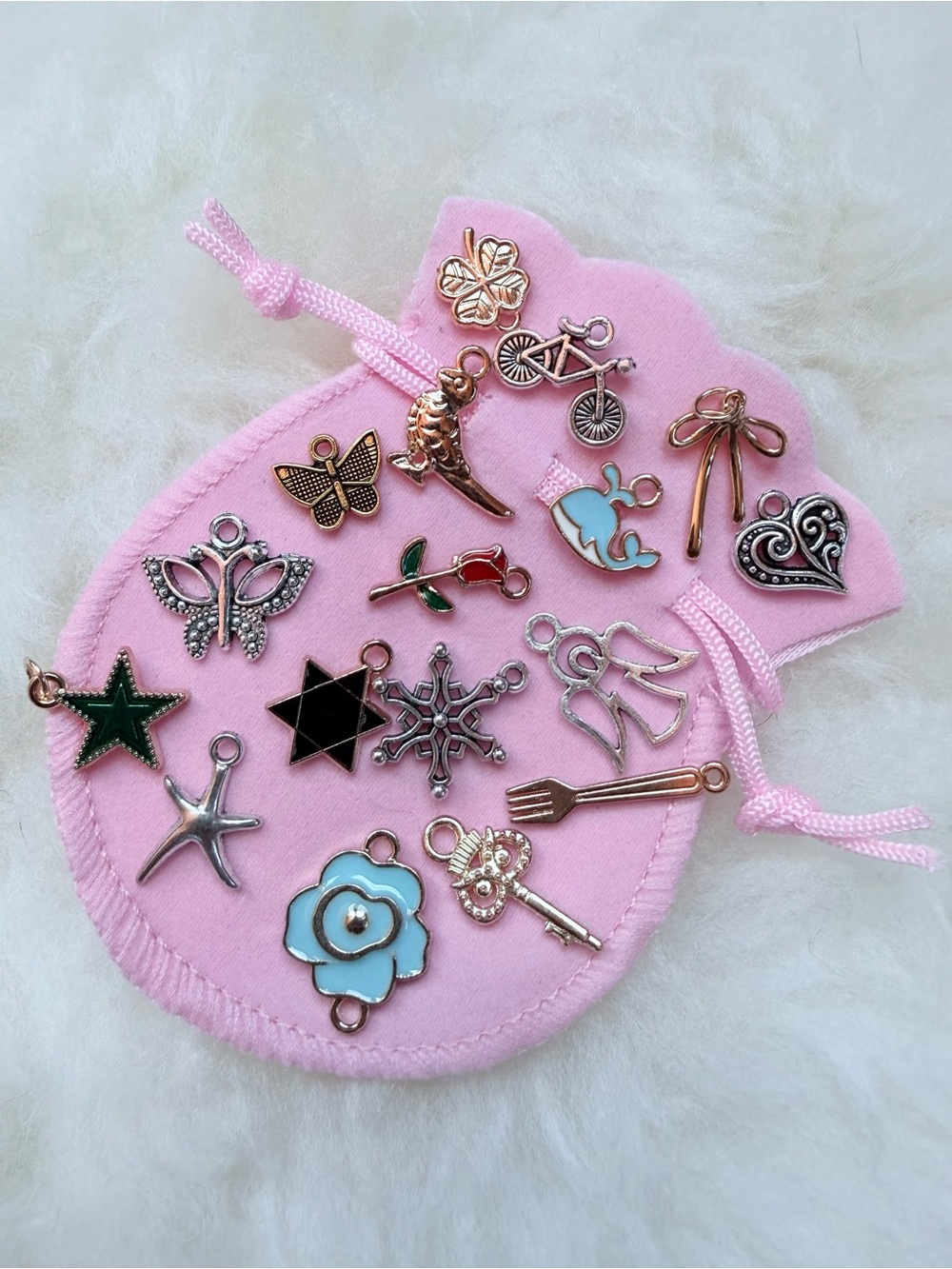 Assorted Enamel, Silver, and Gold Tone Charms